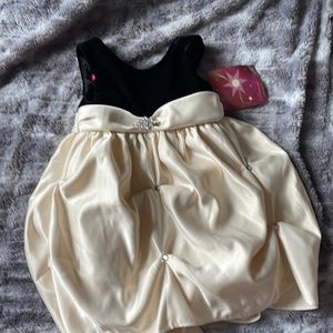 Brand new, with tags black and cream formal 24M dress